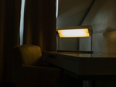 Minimalist workplace with soft ambient lighting for eye comfort